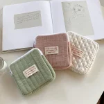 élégante trousse matelassée