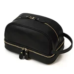 trousse de toillette pour homme cuir noir avec compatiments et fermeture éclaire robuste